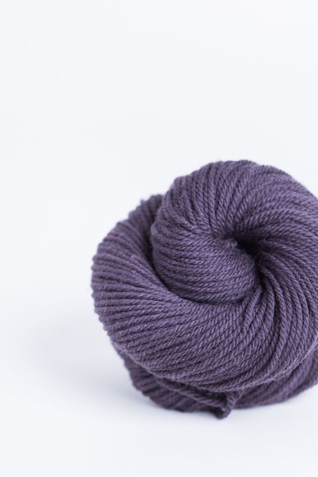 Skein of eggplant purple Brooklyn Tweed Arbor yarn in color Nightfall - Hillsborough Yarn Shop - Hillsborough, NC, USA