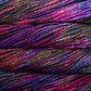 Close up on purple and red variegated skein of Malabrigo Rasta yarn. 