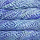 Close up on light blue skein of Malabrigo Rasta yarn. 