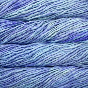 Close up on light blue skein of Malabrigo Rasta yarn. 