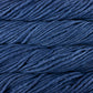 Close up on denim blue skein of Malabrigo Rasta yarn. 