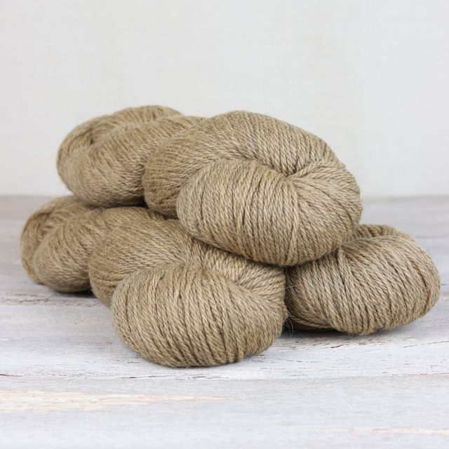 3 skeins of light brown Fibre Co. Cumbria yarn. 