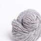 Heathered gray ball of Brooklyn Tweed Loft yarn. 