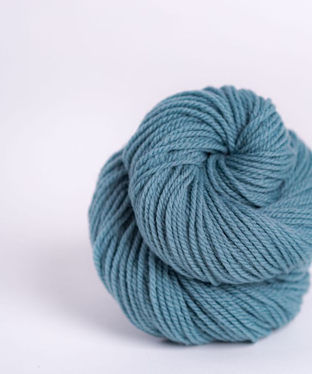 Skein of medium blue Brooklyn Tweed Arbor yarn in color Ranier - Hillsborough Yarn Shop - Hillsborough, NC, USA