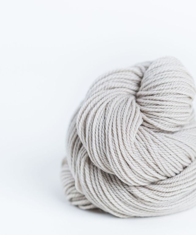 Skein of warm light gray Brooklyn Tweed Arbor yarn in color Driftwood - Hillsborough Yarn Shop - Hillsborough, NC, USA