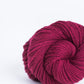 Skein of dark red Brooklyn Tweed Arbor yarn in color Potion - Hillsborough Yarn Shop - Hillsborough, NC, USA