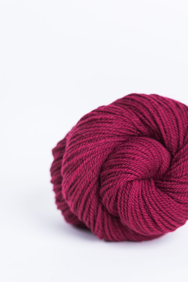 Skein of dark red Brooklyn Tweed Arbor yarn in color Potion - Hillsborough Yarn Shop - Hillsborough, NC, USA