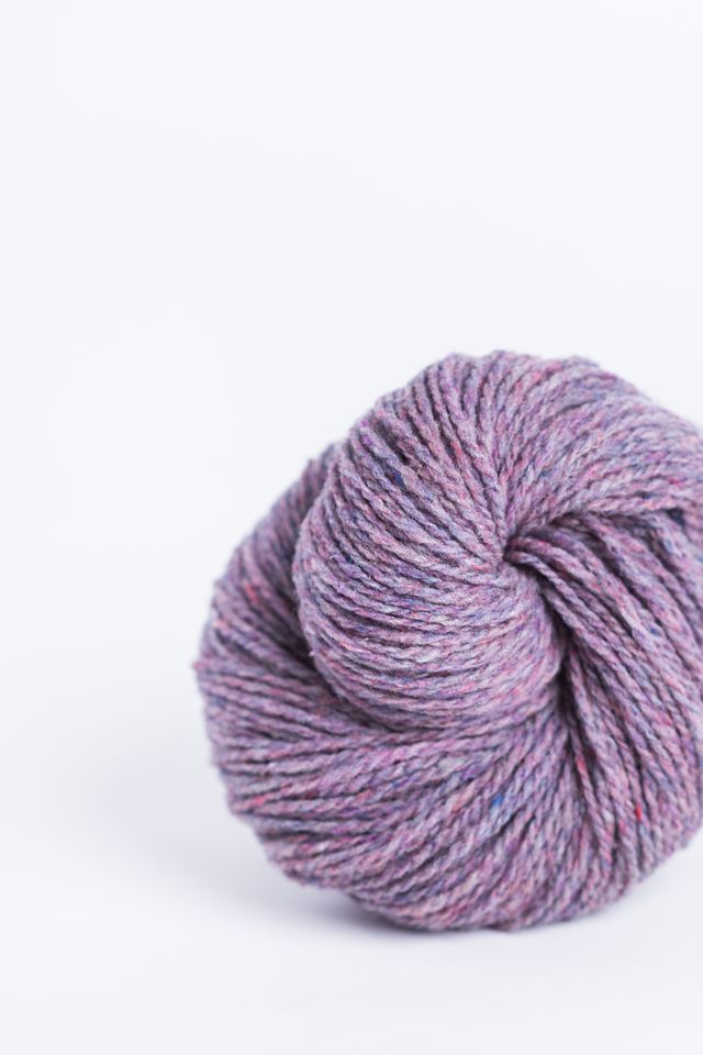 Lavender ball of Brooklyn Tweed Loft yarn. 