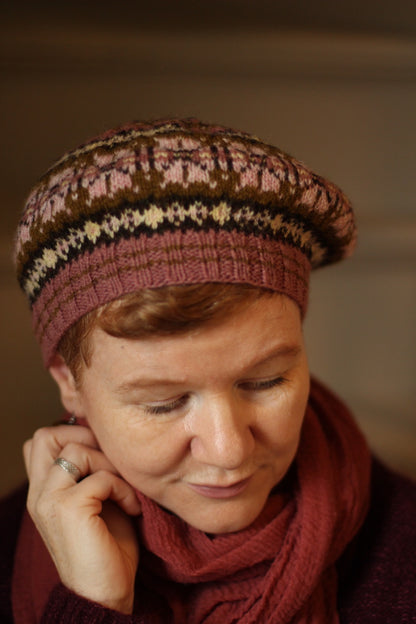 Designer Gudrun Johnston models the Simply Shetland Holiday Hat for 2024.