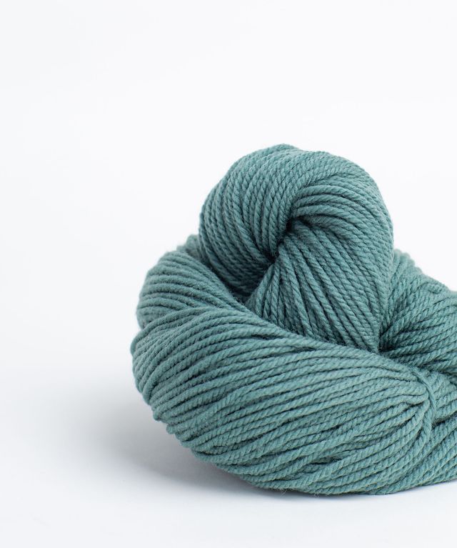 Skein of medium blue green Brooklyn Tweed Arbor yarn in color Lovat - Hillsborough Yarn Shop - Hillsborough, NC, USA