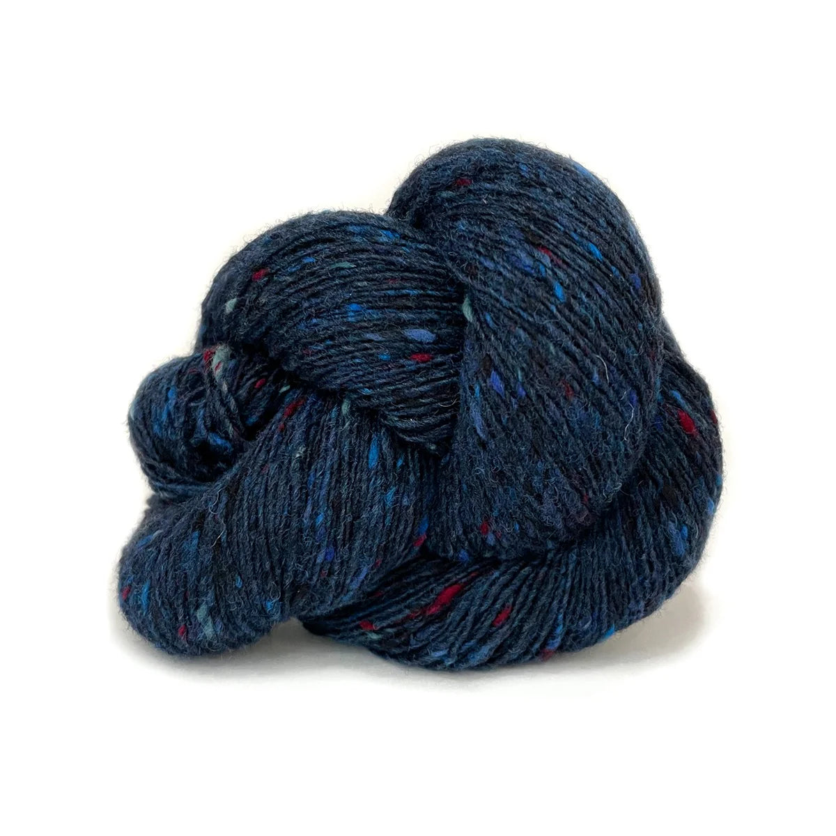 Skein of dark blue tweed Kelbourne Woolens Cricket yarn. 