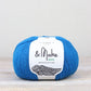 Bright blue ball of Fibre Co. & Make Aran yarn. 