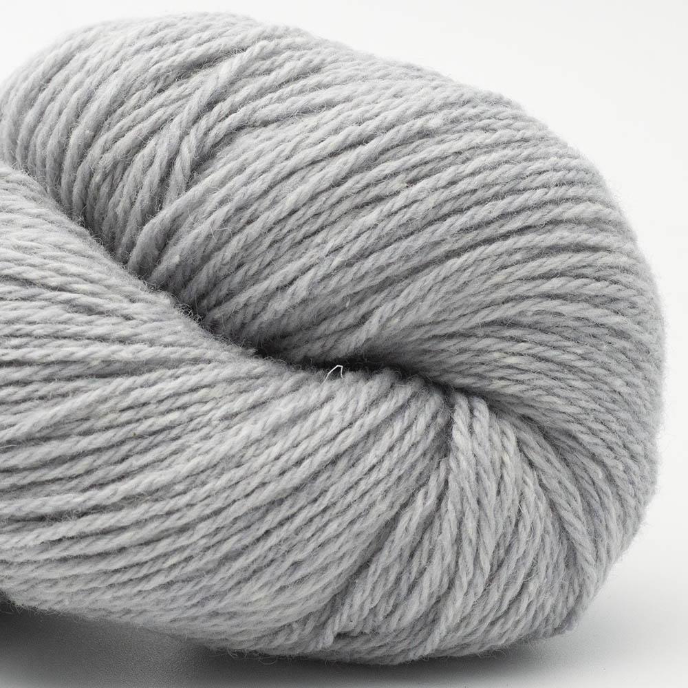 Close-up photo of a skein of Bio Balance yarn in light grey.