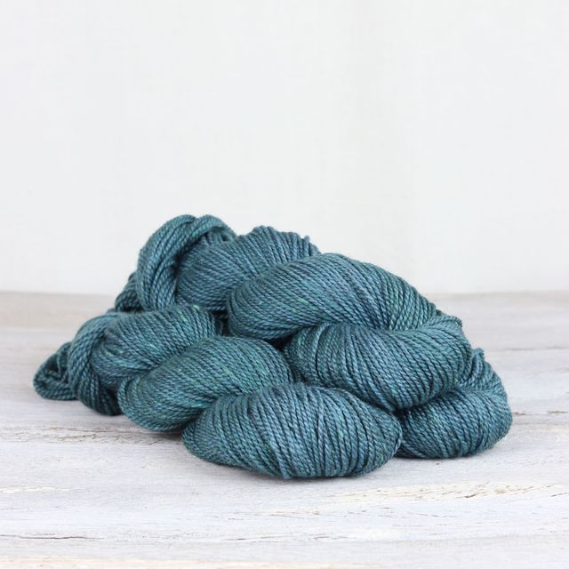 3 skeins of turquoise Fibre Co. Acadia yarn. 