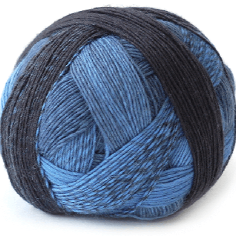 One ball of Schoppel-Wolle lace merino yarn in blue ombré. 