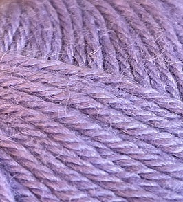 Close up on a lavender ball of Plymouth Baby Alpaca DK yarn.