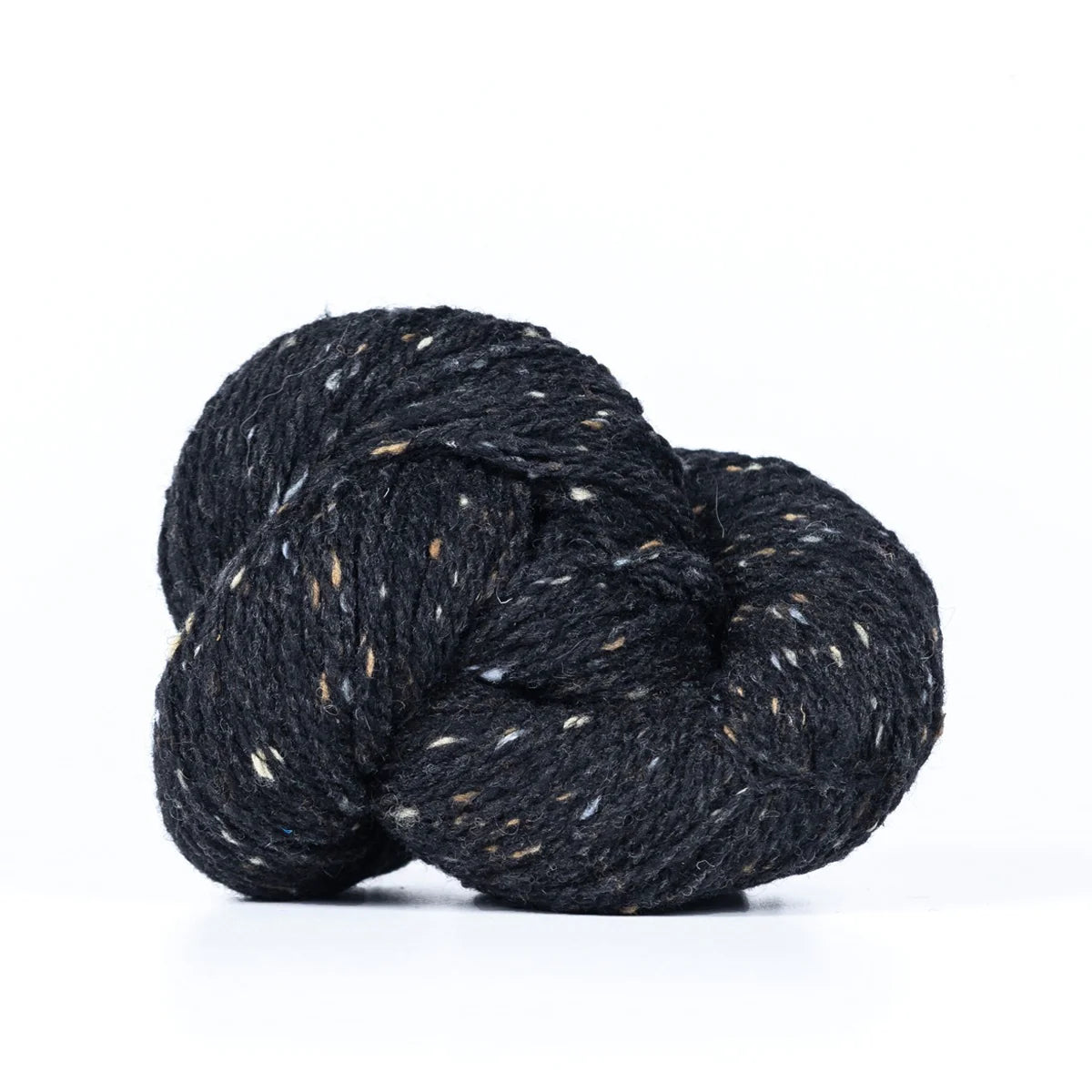 Skein of black Kelbourne Woolens Lucky Tweed yarn. 