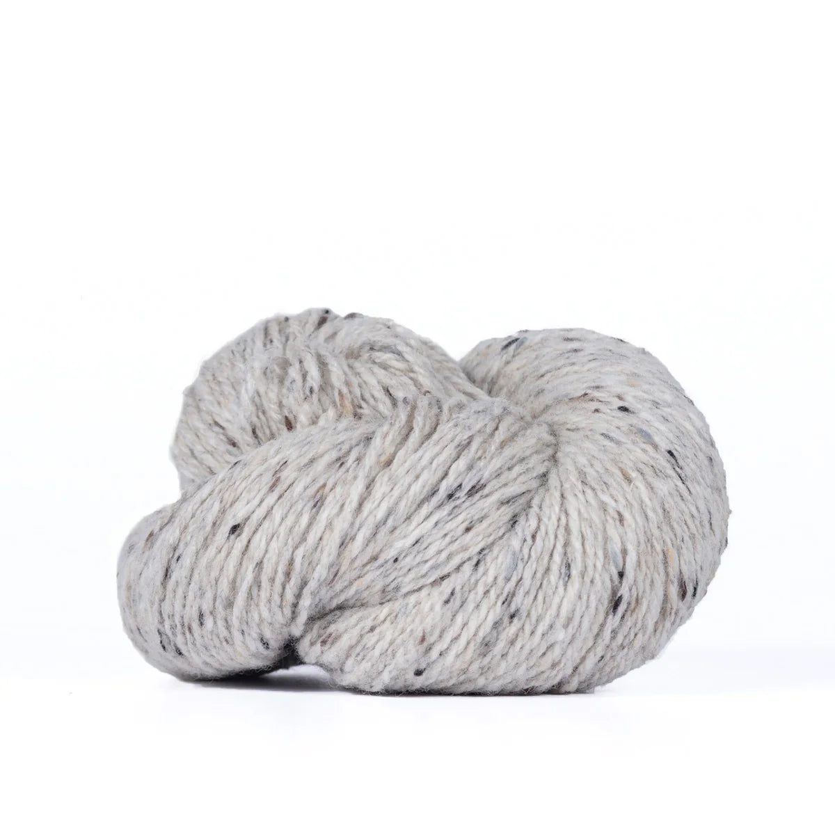 Skein of light gray Kelbourne Woolens Lucky Tweed yarn. 