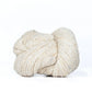 Skein of natural white Kelbourne Woolens Lucky Tweed yarn. 