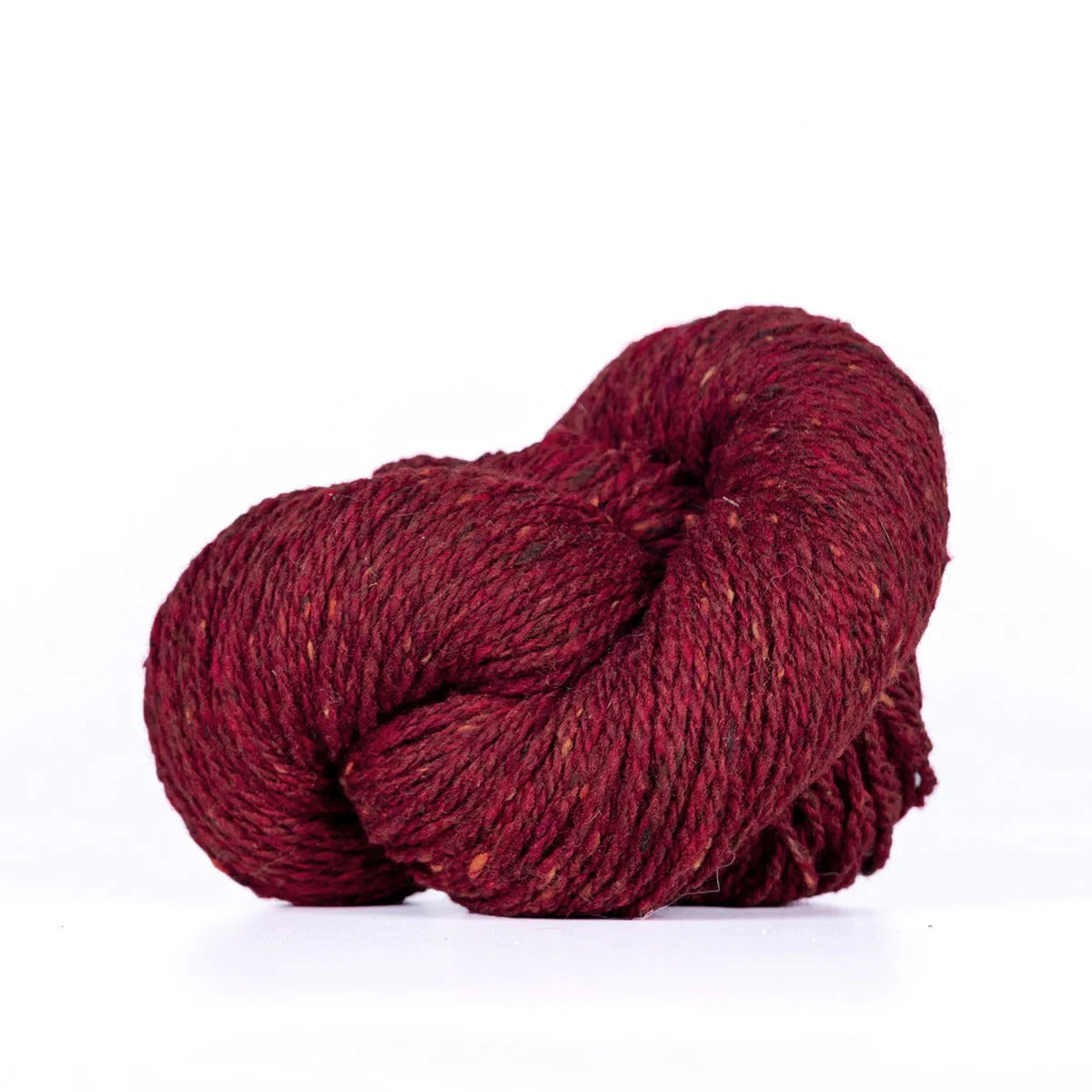 Skein of red Kelbourne Woolens Lucky Tweed yarn. 