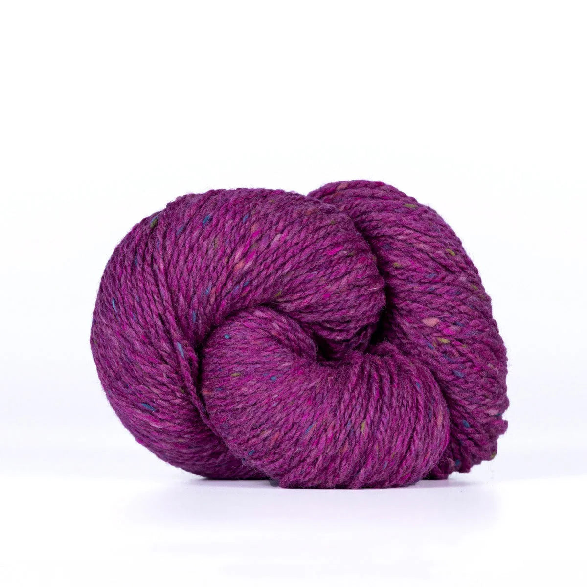 Skein of Fuscia Kelbourne Woolens Lucky Tweed yarn. 