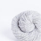 Light heathered gray ball of Brooklyn Tweed Loft yarn. 