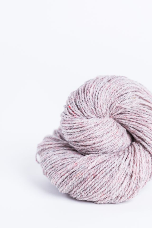 Pink gray ball of Brooklyn Tweed Loft yarn. 