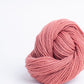 Skein of warm pink Brooklyn Tweed Arbor yarn in color Mesa - Hillsborough Yarn Shop - Hillsborough, NC, USA