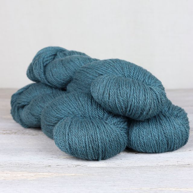 3 skeins of teal blue Fibre Co. Cumbria yarn. 