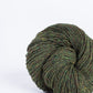 Olive green ball of Brooklyn Tweed Loft yarn. 