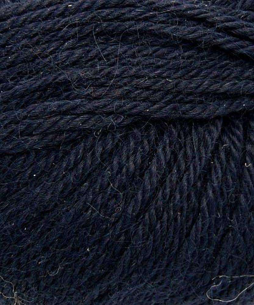 Close up on a navy ball of Plymouth Baby Alpaca DK yarn.