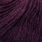 Close up on a dark purple ball of Plymouth Baby Alpaca DK yarn.