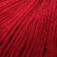 Close up on a bright red ball of Plymouth Baby Alpaca DK yarn.