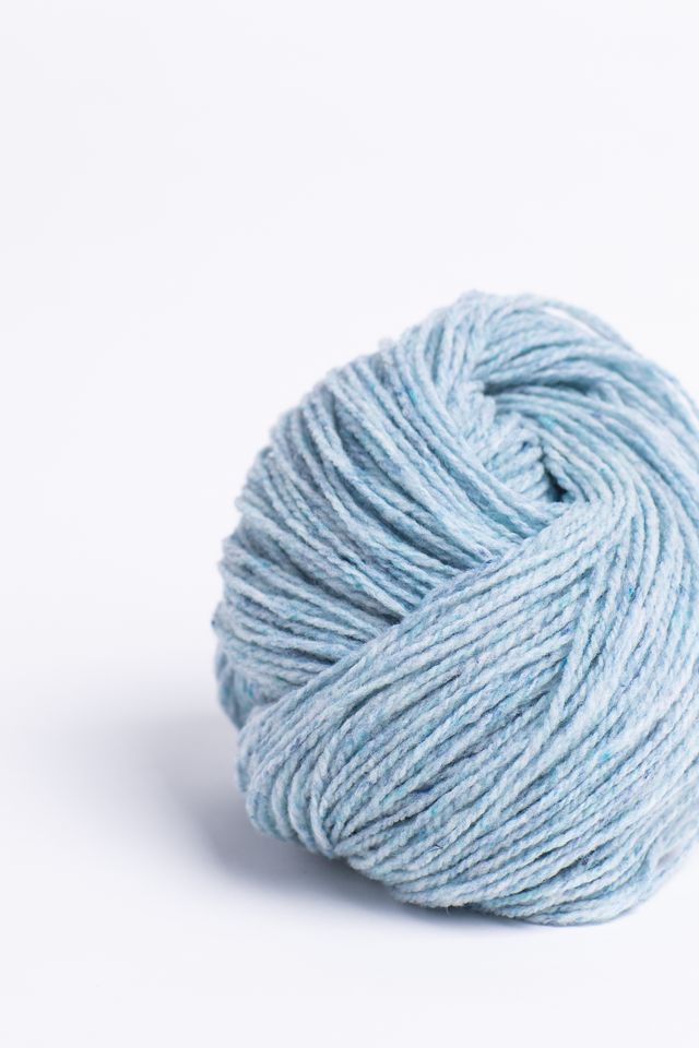 Ice blue ball of Brooklyn Tweed Loft yarn. 