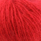 Close up on ball of bright red Plymouth Angora yarn. 