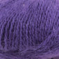 Close up on ball of bright purple Plymouth Angora yarn. 