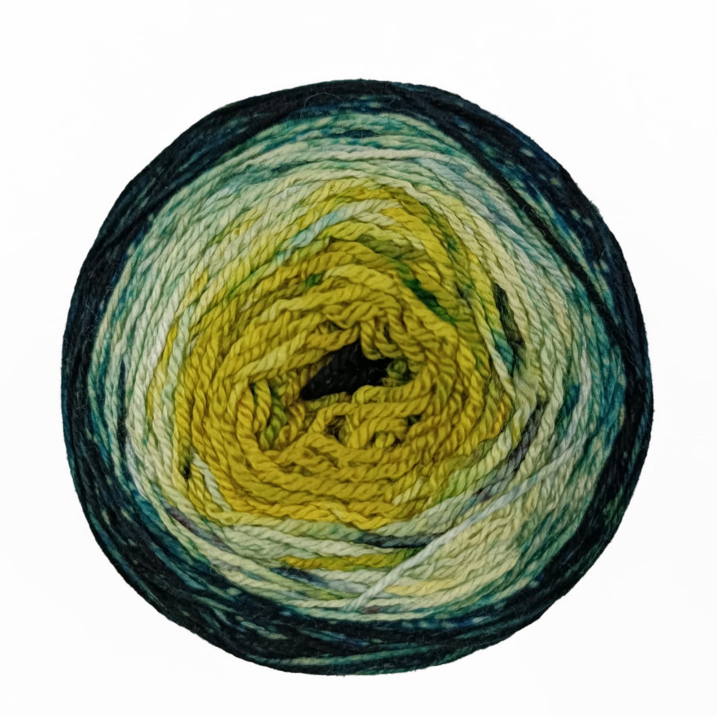 Ball of gradient Malabrigo Metamorphosis Sock yarn in shades of green. 