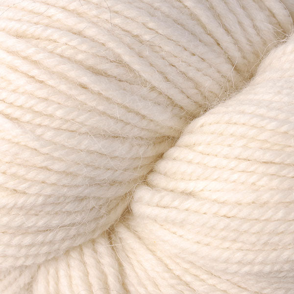 Close up on cream colored skein of Berroco Ultra Alpaca yarn.