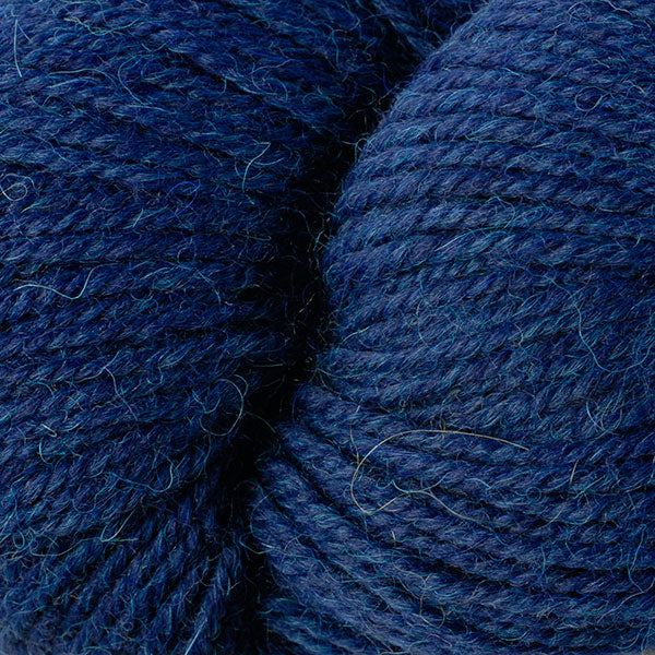 Close up on deep teal skein of Berroco Ultra Alpaca yarn.