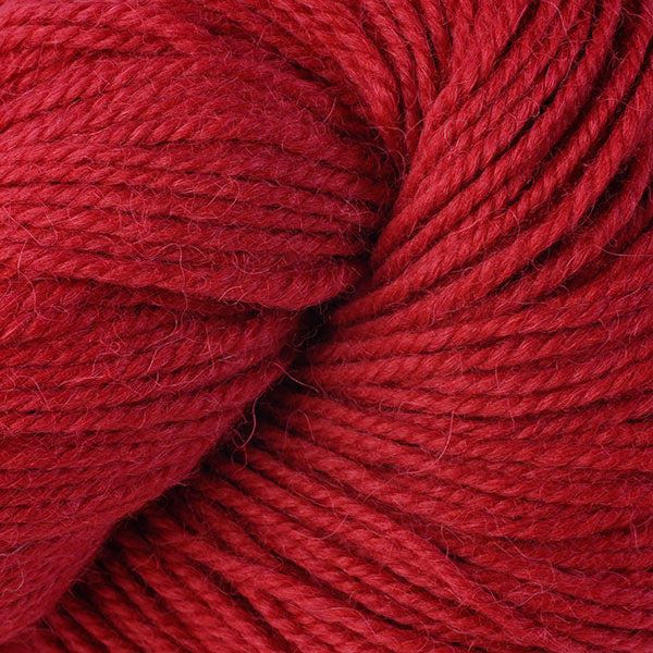 Close up on red skein of Berroco Ultra Alpaca yarn.