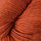 Close up on pumpkin orange skein of Berroco Ultra Alpaca yarn.