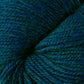 Close up on dark turquoise skein of Berroco Ultra Alpaca yarn.