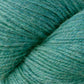 Close up on grass green skein of Berroco Ultra Alpaca yarn.