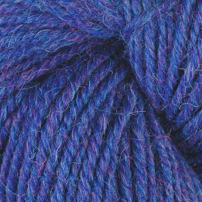 Close up on royal blue skein of Berroco Ultra Alpaca yarn.