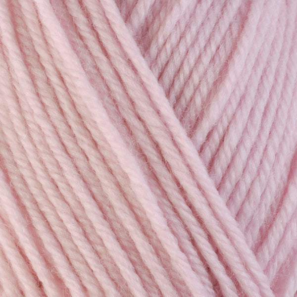 Close up on light pink ball of Berroco Ultra Wool yarn.