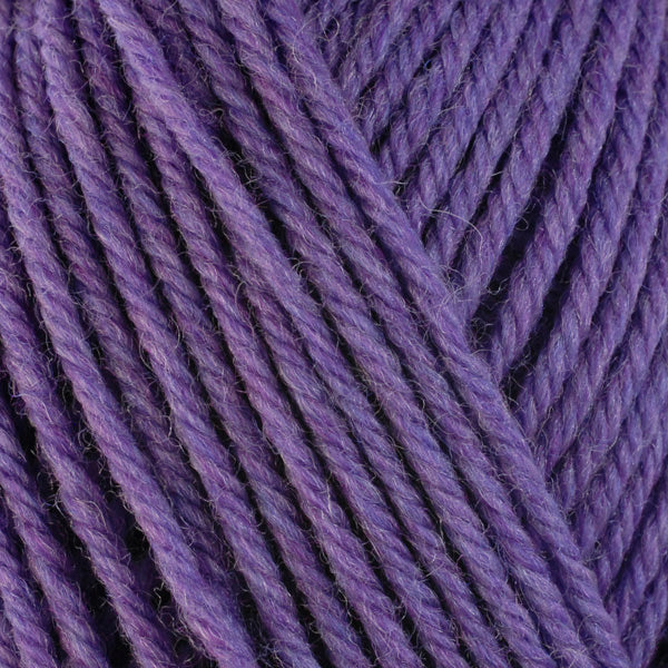 Close up on purple ball of Berroco Ultra Wool yarn.