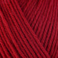 Close up on red ball of Berroco Ultra Wool yarn.