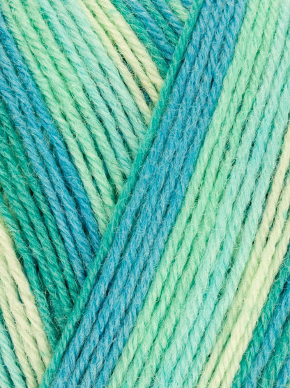Close-up of green and blue yarn with a gradient effect