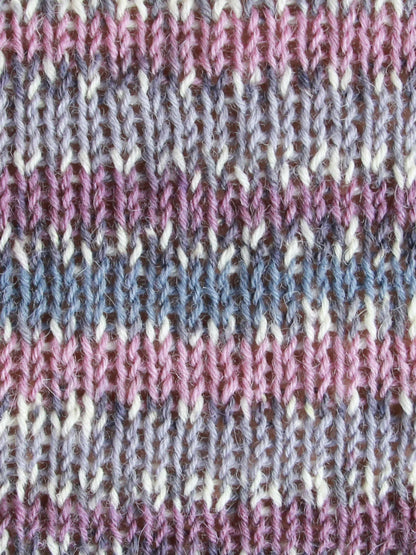 Close-up of WYS Signature 4ply swatched fabric in color Woodpigeon with irregular stripes.
