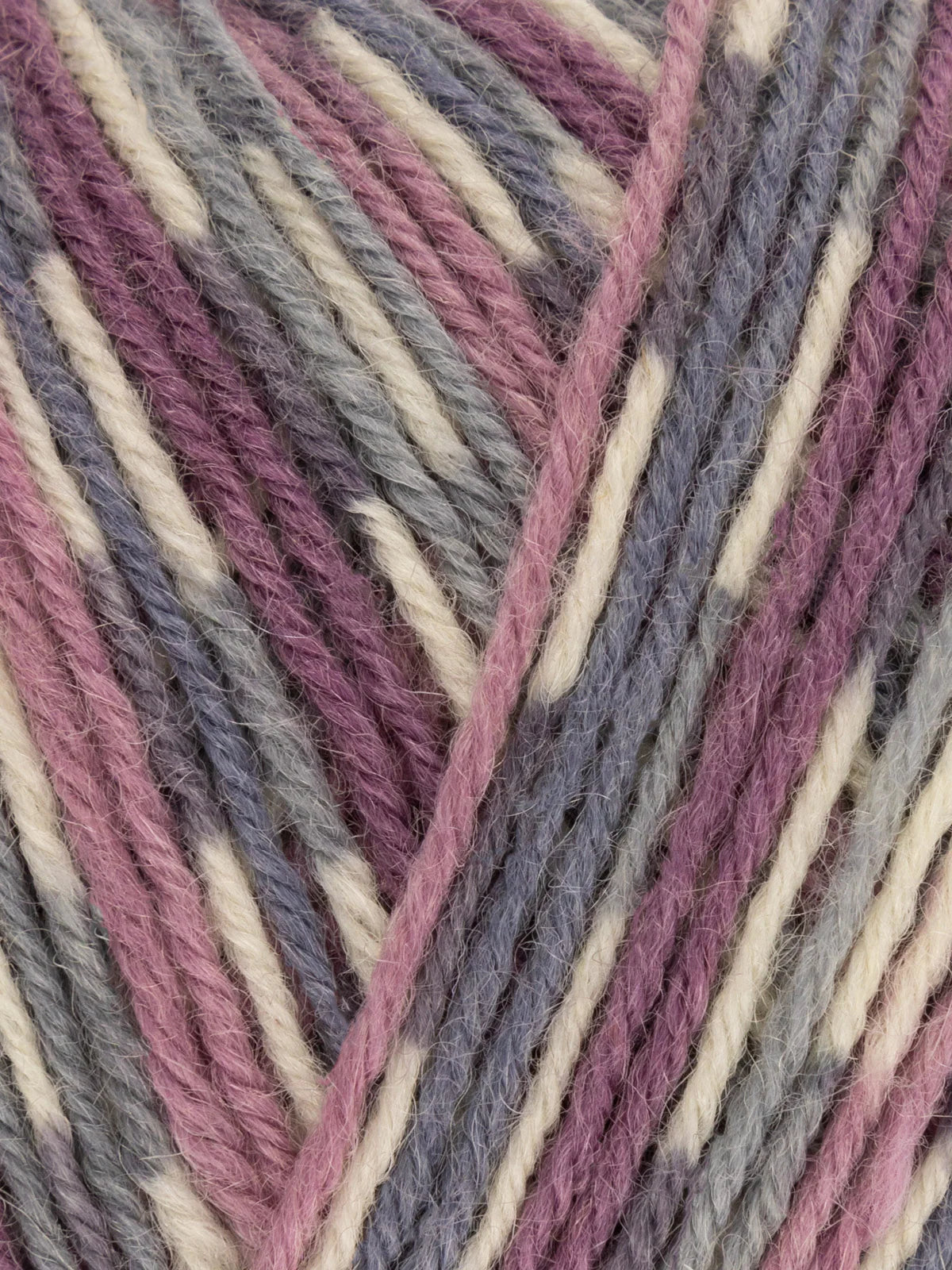 Close-up of WYS Signature 4ply in color woodpigeon, a yarn with gray blue, purple, and beige stripes.